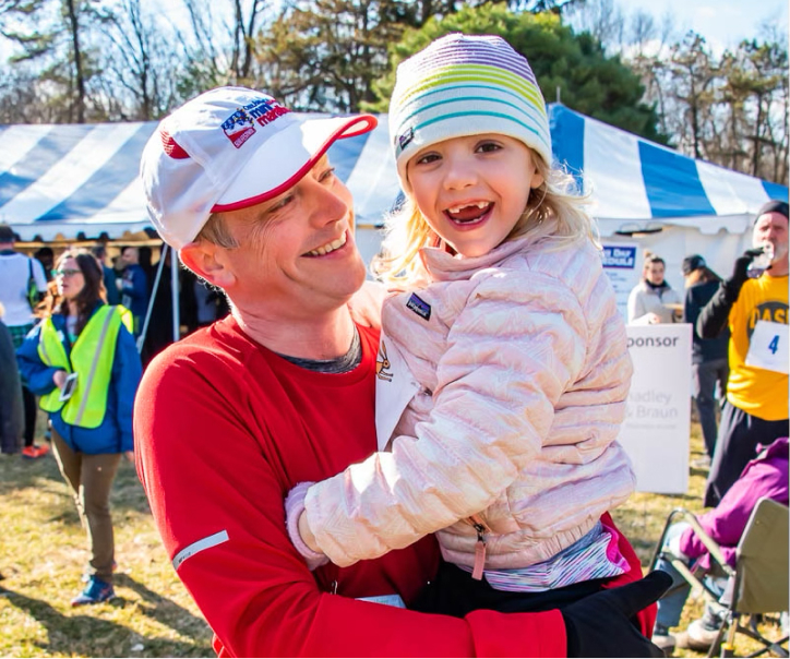 Sam and his daughter complete a race